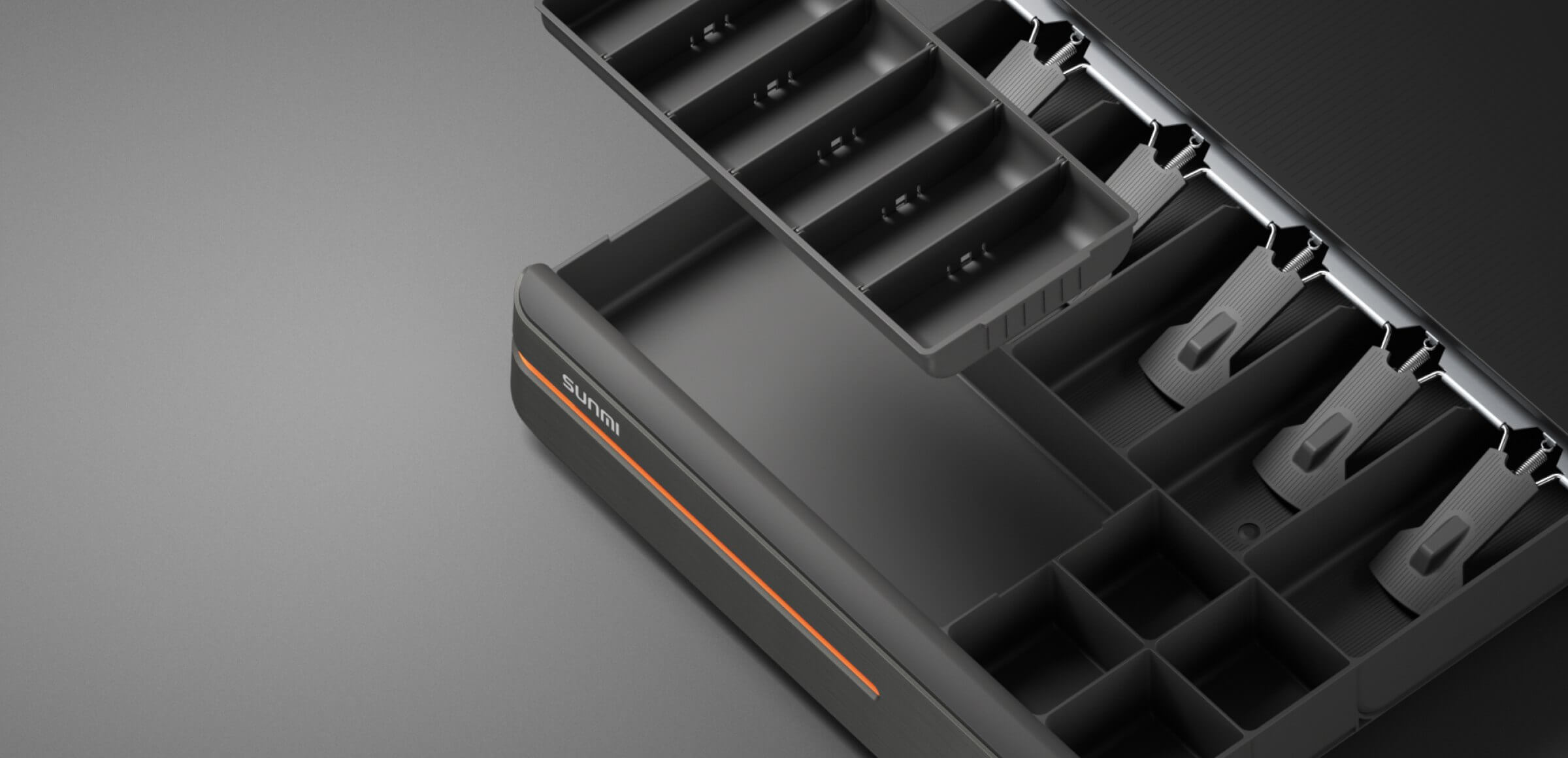 Close-up of the open Sunmi cash drawer's interior, showcasing removable and configurable trays for flexible cash and coin handling.